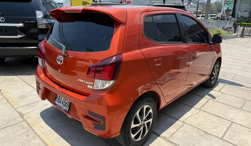 TOYOTA AGYA 2019 ANARANJADO METALICO lleno