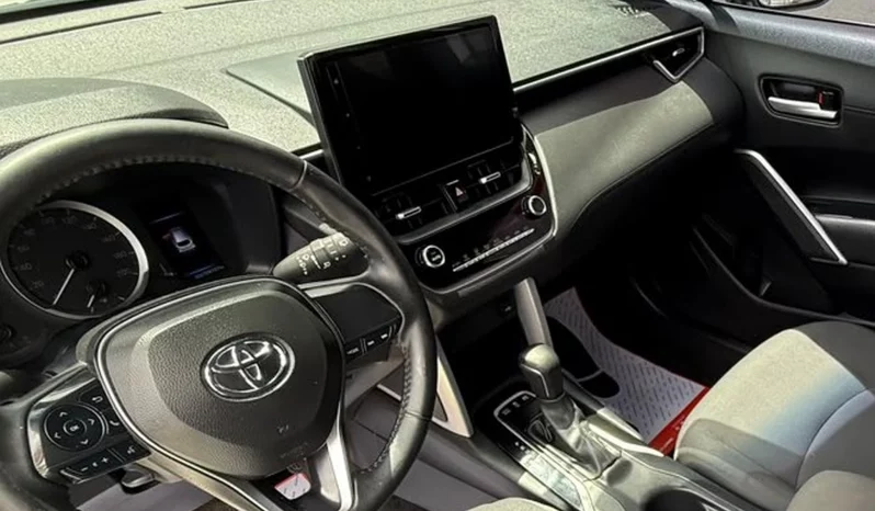 TOYOTA COROLLA CROSS 2023 BLANCO PERLA lleno